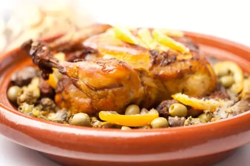 Chicken Tagine with Caramelized Onions, Raisins, and Saffron (Mrouzia-Style)